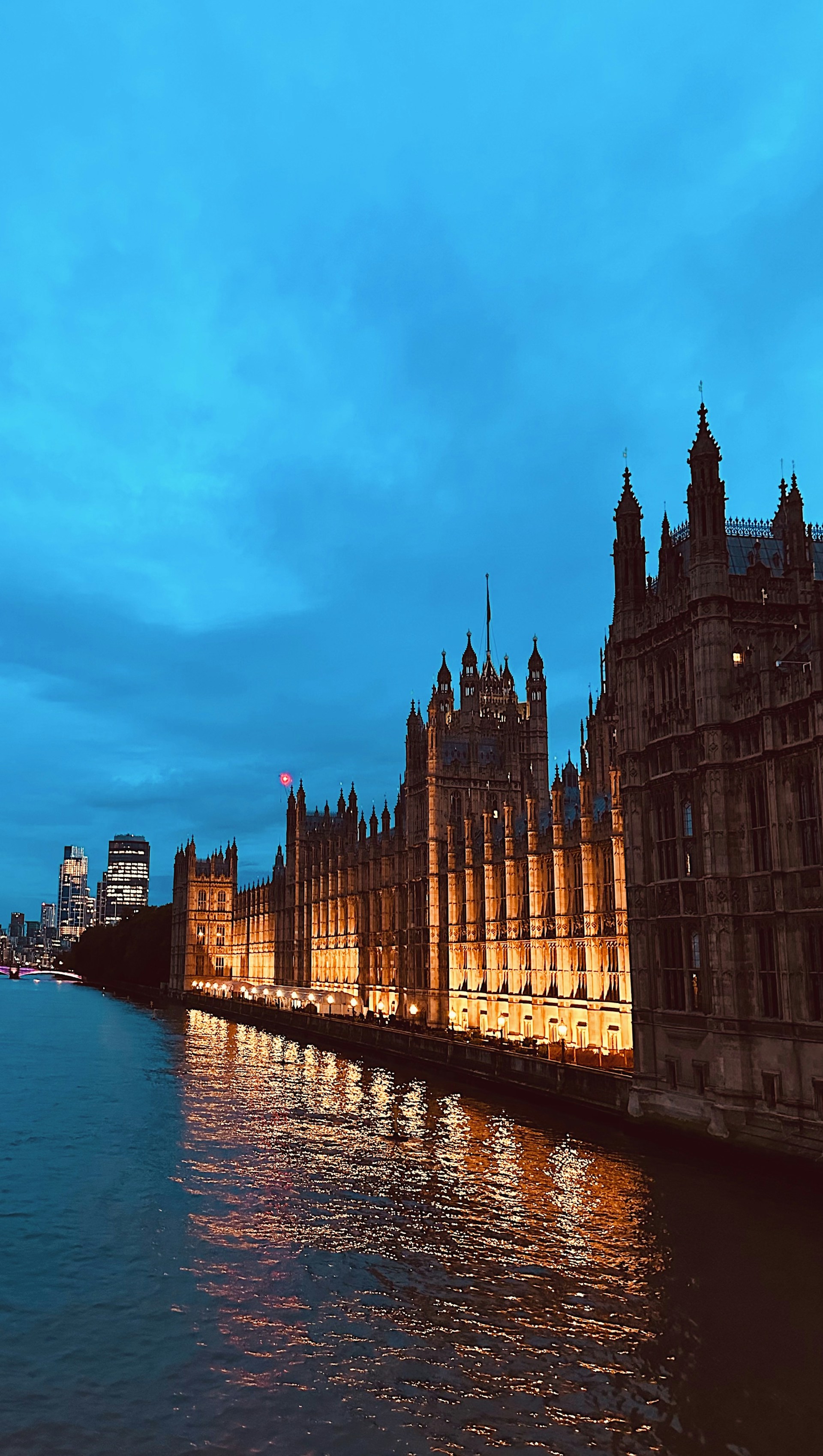 London cityscape illuminated at dusk with historic buildings