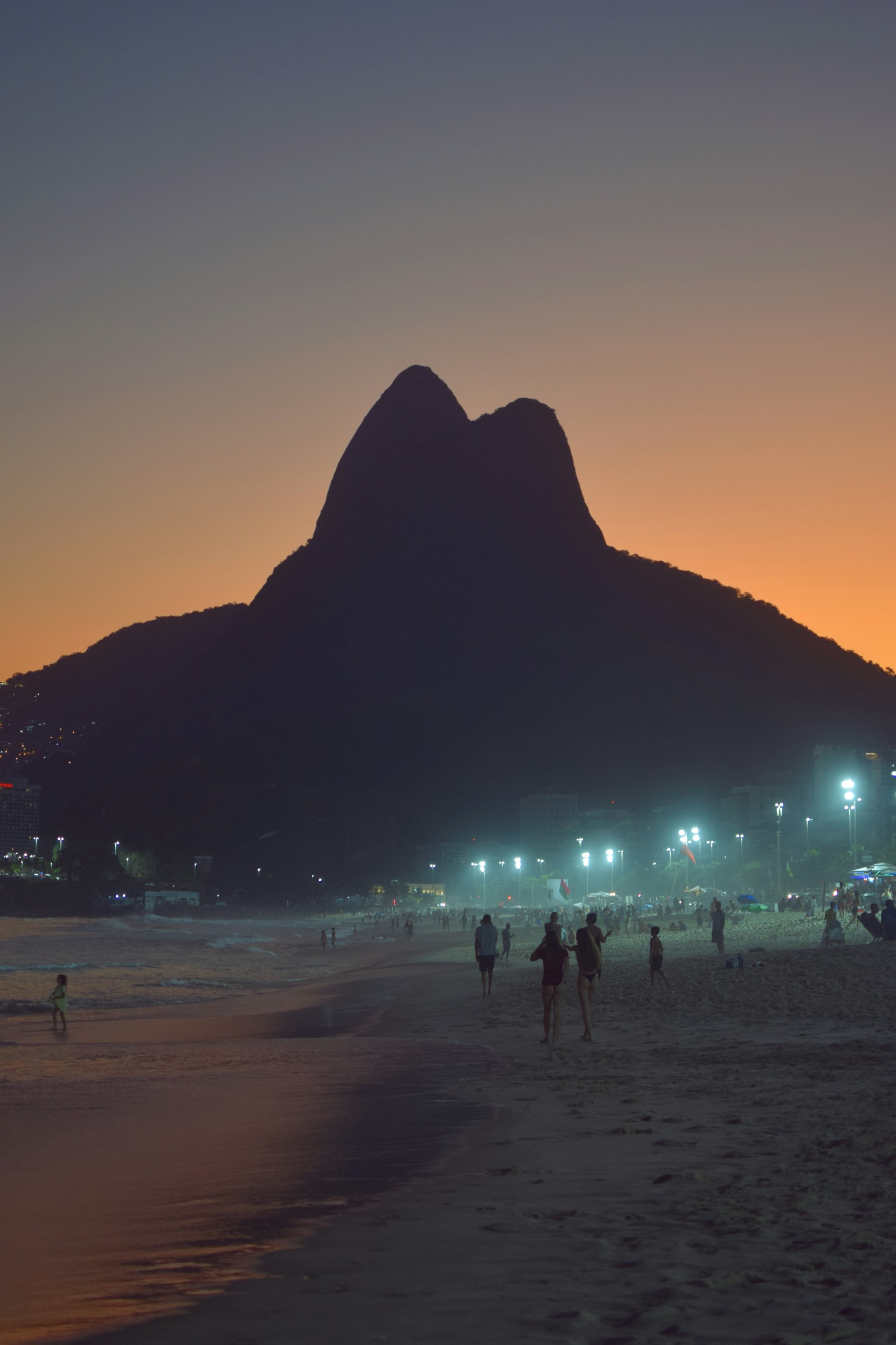 Rio de Janeiro city skyline at night with illuminated buildings