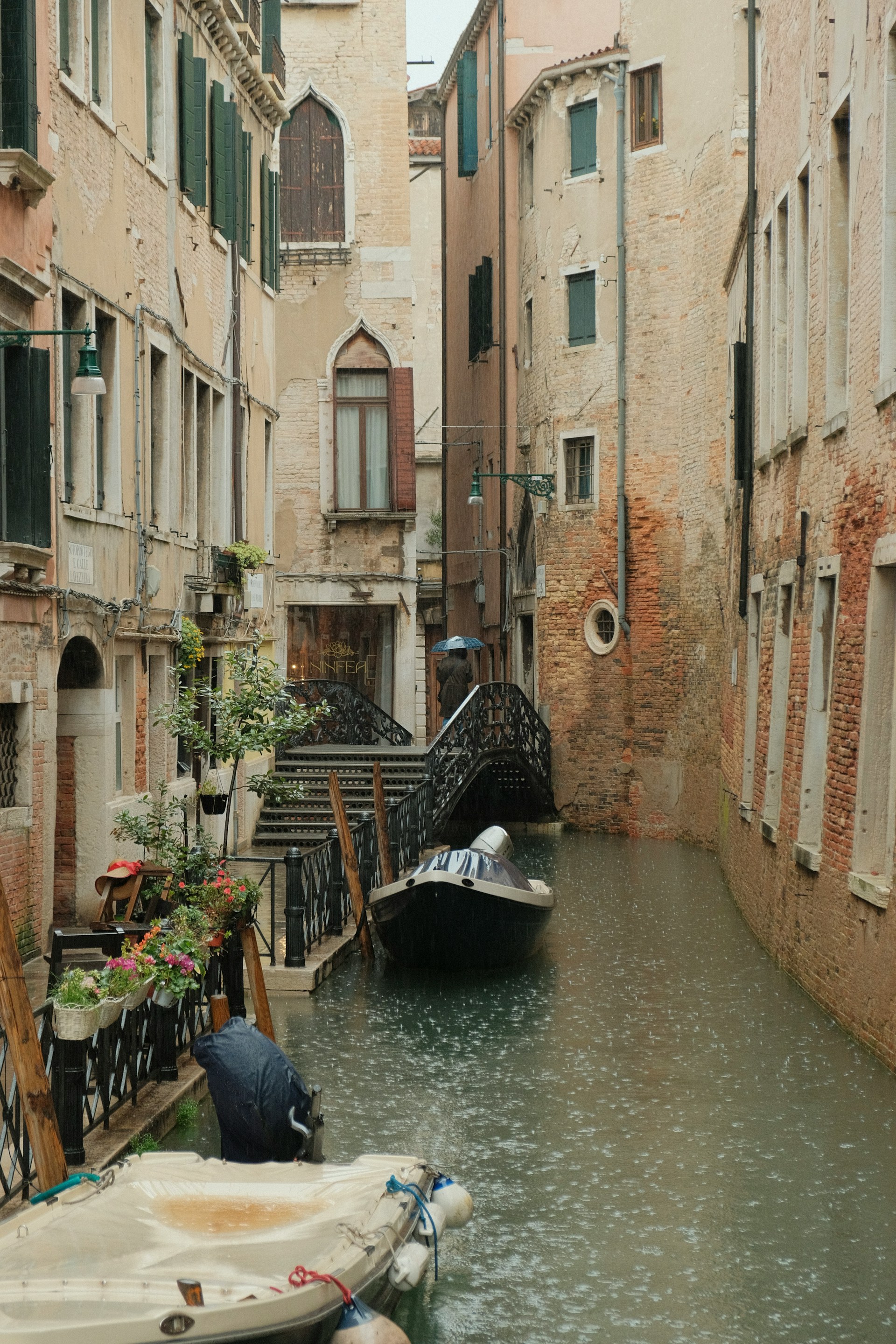 Tucked-away residential canal lined with historic Venetian buildings